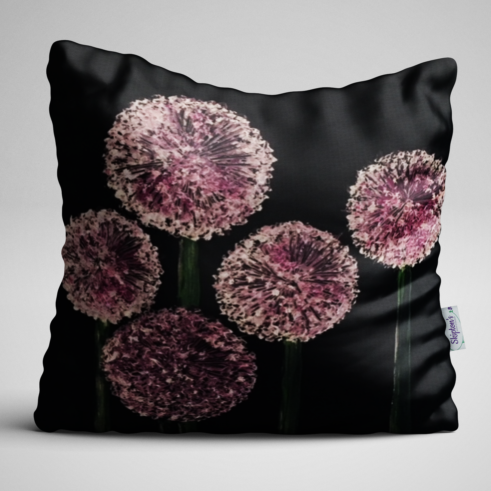 Pink Allium Heads on luxury velvet cushion