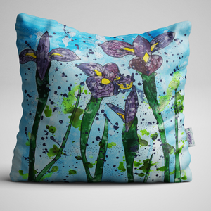 Luxury Velvet Cushion with purple Iris on a blue background